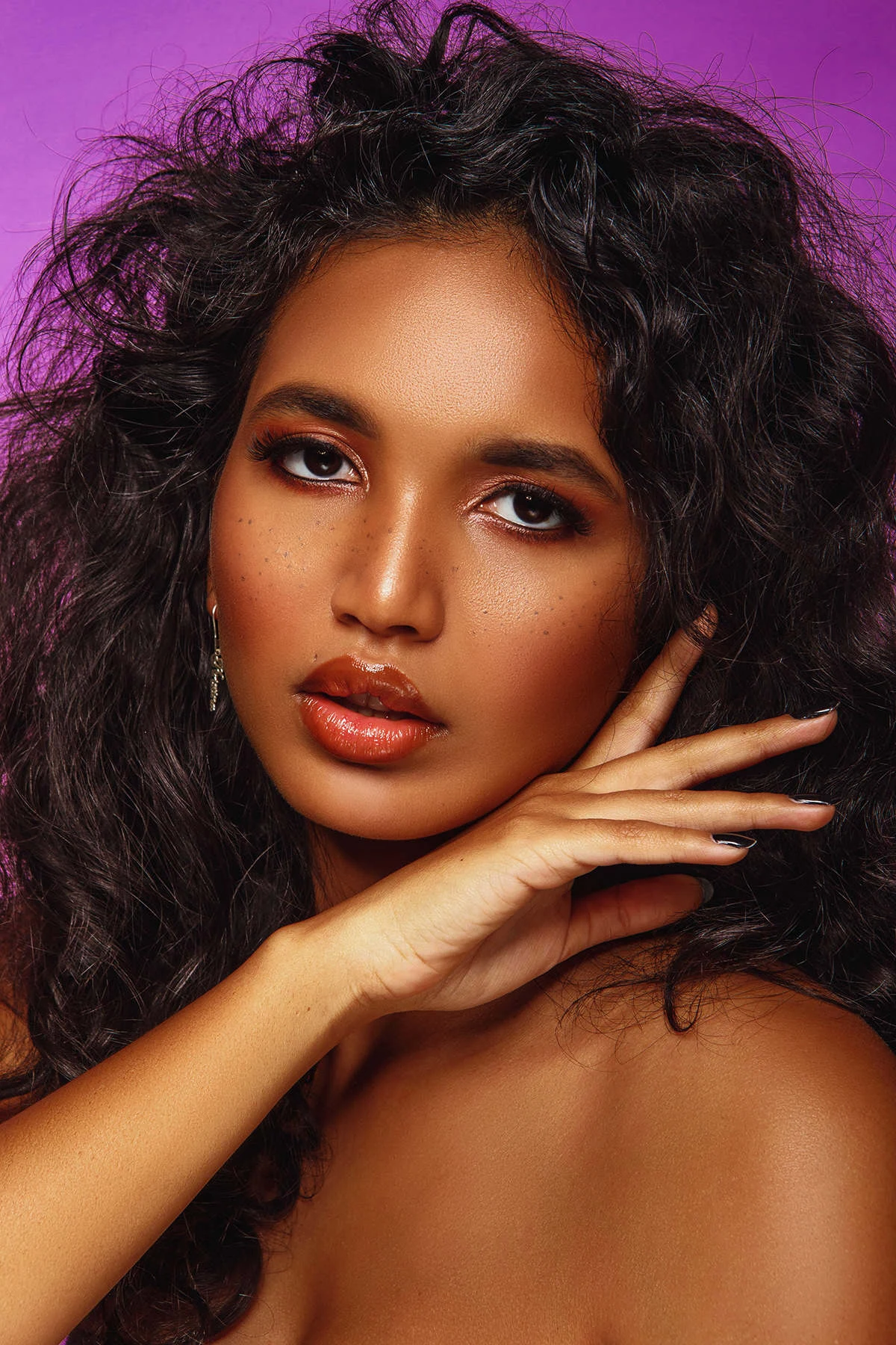 Beauty close-up, dramatic color makeup, studio light