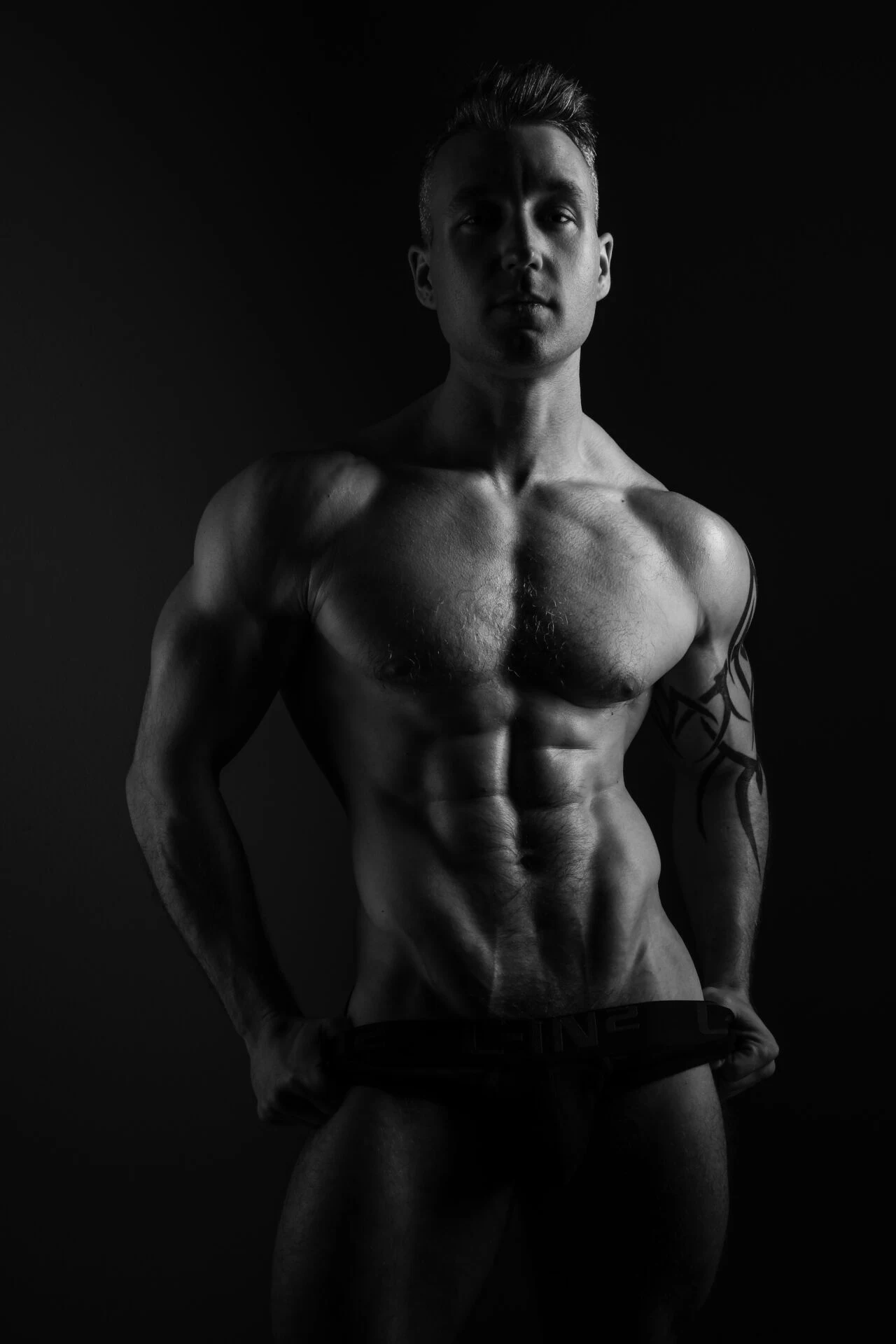 Editorial men's portrait, black and white, studio
